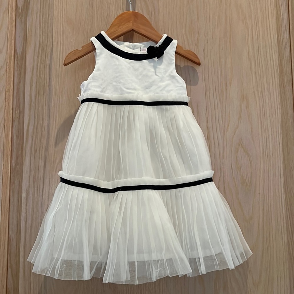 Janie and Jack: White pleated dress with navy trim. 12-18 months